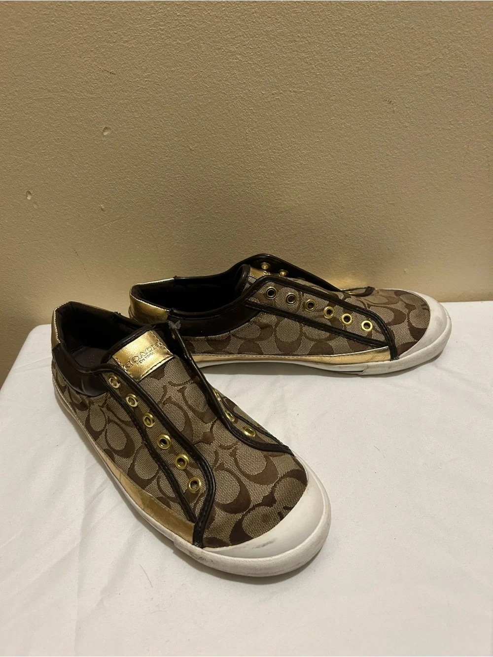 Coach Brown Signature Canvas Slip-On Sneakers with Gold Accents